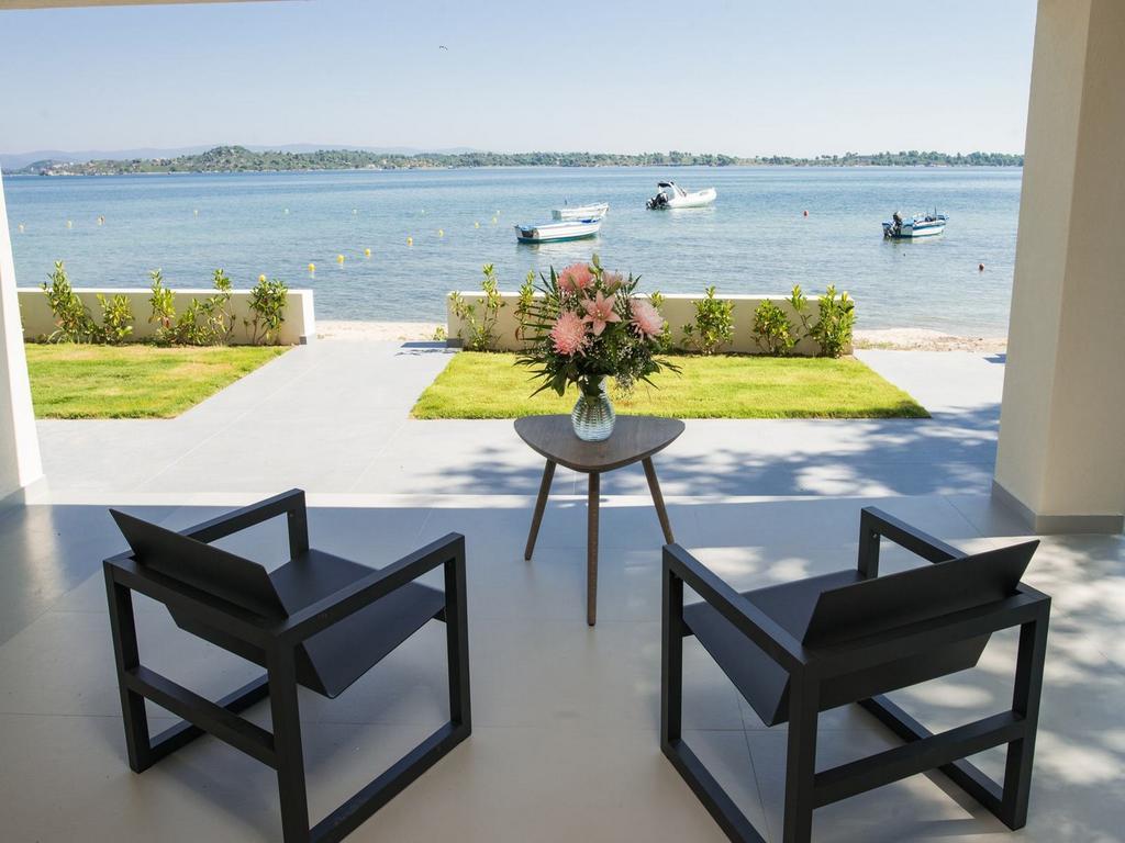 Tiamo Secrets - Beach Front Vourvourou Exterior photo